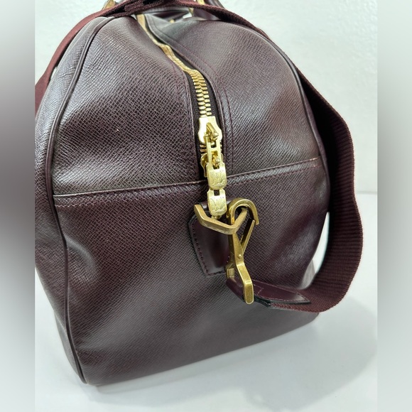 LV38 LOUIS VUITTON Taiga travel bag with strap - Picture 3 of 14